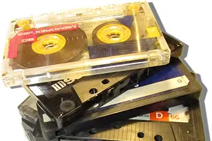 Stack of audio cassette tapes.
