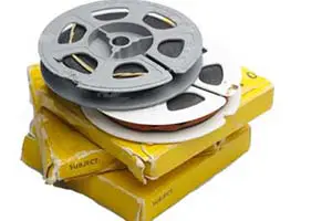 A stack of 8 millimeter film reels.